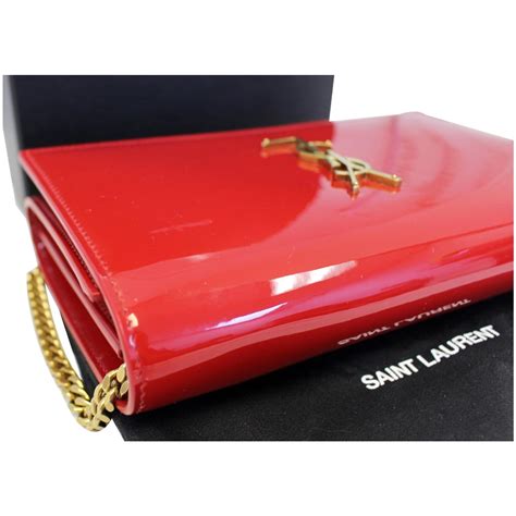 yves saint laurent red purse.